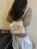 Mochila de puntos estilo coreano transfronteriza para mujer, nueva mochila versátil y elegante 2026 para estudiantes para ir al trabajo