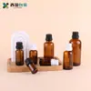 Shengyao Spot Amazon Transfronterizo Botella de Aceite Esencial Marrón a Prueba de Luz de 30 ml Botella de Vidrio para Esencia de Aceite Esencial de 50 ml