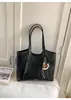 Bolso Tote de Lujo de Nicho Gama Alta 2026 Nuevo de Moda Retro Gran Capacidad Bolso de Mano Simple Casual Bolso de Hombro