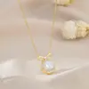 Cadena de Clavícula Elegante con Baño de Oro Real y Circonita para Mujer, Diseño de Nicho, Collar con Colgante de Lazo, Cadena Versátil para Suéter