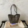 Bolsa de Mão Estampa de Leopardo Feminina Grande Capacidade 2026 Nova Outono Inverno Nicho Vintage Ombro Único Axila Bolsa Trabalho Deslocamento Bolsa Saco