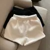 Shorts largos estilo A-line da moda para mulheres, versão coreana outono e inverno 2026 novos shorts boot de cintura alta retos emagrecedores para uso casual