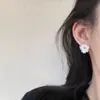 Pendientes de girasol estilo coreano, flor geométrica, perla, diseño nicho, temperamento, combinan con todo, alta gama, pin de plata dieter