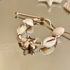 Pulsera trenzada de conchas estilo resort costero bohemio, ajustable con cordón, pequeña, fresca, de moda, de alta gama