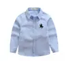 Camisa de manga larga para niños para primavera y otoño, camisa de lunares con cuello para niños, estilo casual europeo y americano, fabricante transfronterizo, ropa para niños al por mayor en stock