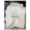Suave y pegajoso tacto cachemir cuello medio alto camiseta base de punto para mujer otoño e invierno ropa interior suéter blanco cuello alto manga larga top
