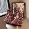 Bolsa de lona estilo étnico 2024 Nueva moda bolsa tote de gran capacidad para el día a día femenina ins Mochila escolar de universidad femenina