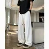 Pantalones casuales negros delgados texturizados para hombre, marca de moda de otoño, pantalones rectos holgados de pierna ancha para hombre, pantalones de talla grande para niños