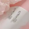 Corea del Sur Dongdaemun Brillo Estelar Estrella Hebilla Oreja Moda Femenina Estrella Hueca Diamante Pendientes Comercio Exterior Transfronterizo Nuevo