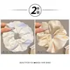 Goma para el pelo tipo scrunchie de encaje con lunares estilo coreano para mujer 2026 Nuevo Modelo de Alta Gama Lazo grande para el pelo Flor de pelo suave Cuerda para el pelo Accesorio para el cabello