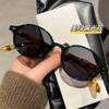 Nueva versión coreana de gafas de sol de montura redonda pequeña con montura de calle sencilla, de red roja, con lentes de sol de gran sentido.