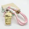 Popular Colgante para Teléfono Móvil de Té Dorado Leche Oro Puro 999 Llavero Colgante para Bolso Regalo para Novia y Mejor Amiga