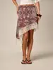 Moderna falda midi de cintura alta asimétrica con patchwork de encaje y diseño de dobladillo inclinado, con un estampado elegante, popular en los mercados transfronterizos europeos y americanos