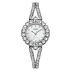 O relógio feminino redondo de quartzo mais vendido da Gedi com pulseira cravejada de diamantes, à prova d'água, estiloso e versátil, relógio de pulso feminino de nicho para o dia a dia.