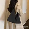 Bolso tote vintage de gran capacidad para el día a día, nuevo modelo otoño 2026, bolso de hombro casual de moda de alta gama