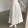 Corea del Sur chic Primavera Estilo francés elegante cintura alta cobertura cruzada adelgazante color liso versátil falda plisada línea A falda larga para mujer