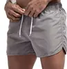 2022 Novo Aliexpress Nova Moda Masculina Shorts de Praia Poliéster Multicor Esportivos Shorts de Três Pontos Masculino