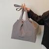 Bolso de lona sencillo e informal para mujer, bolso de mano de estilo coreano de gran capacidad, bolso de hombro moderno y a la moda para primavera y verano 2025.