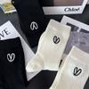 Calcetines Jisixiang para mujer, otoño e invierno, nuevos calcetines de media pantorrilla bordados de estilo coreano, de algodón peinado, de cintura alta, en blanco y negro, calcetines deportivos