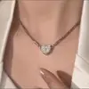 Temperamento minoritario europeo y americano diseño de alta gama transfronterizo collar magnético de amor cadena de hueso de serpiente multicapa cadena de clavícula femenina de diamante