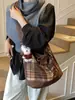 Bolsa de Lona Casual de Gran Capacidad para Mujer 2025 Nuevo Bolso Cruzado Versátil para Viajes Diarios Bolso Tote Relajado Bolso Cubo