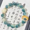 Pulsera de mano bodhi con mantra de seis sílabas de flor flotante púrpura, talla de león, estudiantes alrededor del dedo, cuentas de juego de texto suave, pulsera de placa de juego al por mayor