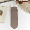 Meias para mulheres outono e inverno novos produtos ins coreanas fio de bolinhas cor sólida meias planas da moda meias caneladas meias versáteis de cano médio meias femininas