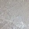 Jiaxin têxtil outono e inverno Novo tecido de base de malha de poliéster 3-5 lantejoulas PET bordado linear escamas de peixe tecido de lantejoulas listrado