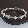 Pulsera de moda transfronteriza de Amazon de diamantes de imitación de una sola fila de diamantes completos de circonita con engaste de garra para mujer, pulsera abierta de personalidad, joyería al por mayor
