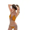 Nuevo en stock Bikini triángulo de color sólido europeo y americano Traje de baño dividido transfronterizo Venta al por mayor Traje de baño sexy para damas bikini