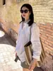 Ropa del mismo estilo de Song Hye-kyo, nueva camisa larga de manga larga suelta y ligera de primavera-verano, camisa protectora solar, camisa blanca de rayas verticales para mujer