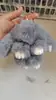 Chaveiro de Pelúcia Imitação de Coelho Rex - Pingente de Pelúcia Conforme Normas Internacionais