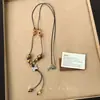 Moda Trendy Lujo Ligero Hecho a Mano con Perlas Estilo Étnico Collar Largo Cadena para Suéter Personalidad Dulce Fresco Sensación de Alta Gama Collar Gargantilla