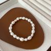 Corea del Sur perla natural de agua dulce grande Barroca retro Francés pulsera elástica elegante simple Cobre chapado oro real