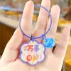 Llavero de Cuerda de Acero Dorado Acrílico Colgante de Bolso Texto Creativo Lindo Femenino Dos Dimensional Estudiante Regalo Producción