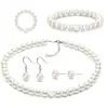 Set de cuatro piezas de joyería de perlas artificiales de estilo delicado, conjunto de collar, pulsera y aretes con accesorios en forma de corazón, accesorios versátiles para banquetes
