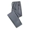 Pantalones de secado rápido para hombre, cintura elástica, talla grande, tela de seda helada, pantalones de verano, adecuados para comercio transfronterizo, corte holgado, estilo casual, frescos, transpirables y elásticos