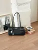 Bolso de lona de alta gama de nicho 2026 nuevo estilo moderno versátil bolso de hombro único de lona bolso tote de hombro único bolsa para ir al trabajo