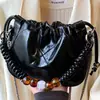 Bolso Pequeño de Moda Primavera/Verano para Mujer 2026 Nuevo Exquisito Versátil Bolso Cruzado con Cadena y Cierre de Cordón Bolso Nube