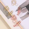 Stock Mayorista del Fabricante de Clips para Papel Creativos y Lindos con Forma de Nota Musical Chapados en Oro, Clips Metálicos para Almacenamiento de Oficina