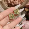 Aretes Doble Flor Camelia Ópera Italiana Bucciarati Rombo de Encaje Glaseado Trébol de Cuatro Hojas Anillo Abierto