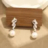 Pendientes Exquisitos de Estilo Niche Japonés y Coreano con Cinta Tachonada de Piedras Pendientes de Perla Simples Versátiles Pendientes No Perforados para Mujer