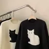 Suéter de abrigo para mujer otoño e invierno 2026 nueva moda versátil estilo suave tejido jacquard gato de dibujos animados suéter de punto para mujer