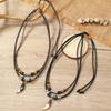 Collar de joyería tejido a mano con nudos de cuentas de madera multicapa, aleación de mariposa artística retro europea y americana