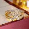 Anillo de Línea Rota Cruzada Nuevo Estilo Europeo y Americano Zirconia Incrustada Venta Caliente Personalidad de Gama Alta Moda para Pareja Versátil
