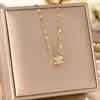 Collar coreano transfronterizo de venta caliente con micro incrustaciones de circonita de acero de titanio para mujer, moda, sentido de alta gama, temperamento, cadena de clavícula, joyería que no se desvanece