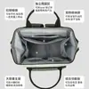 Nueva Bolsa de Mamá Rayada, Mochila Impermeable Multifuncional, Gran Capacidad, Bolso de Moda para Madre e Hijo, Aislamiento Térmico y Ligero
