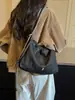 Bolso de mano retro de gamuza para principios de otoño de 2026, bolso de hombro, bolso cruzado, bolso tipo cubo plisado de nube de nicho