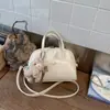Bolsa Boston Feminina 2025 Nova Primavera e Verão Tendência Moda Simples Bolsa de Ombro Crossbody Bolsa Almofada