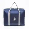 Bolsa de Armazenamento Grande Capacidade Atacado Transfronteiriço, Bolsa de Avião Redonda Espessa com Etiqueta, Bolsa de Armazenamento de Bagagem Multifuncional Portátil Dobrável